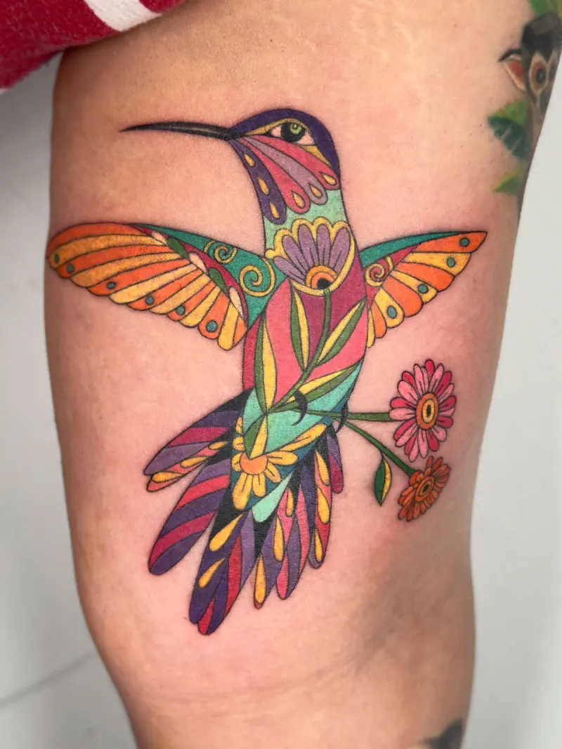 Colibrí con flores a todo color